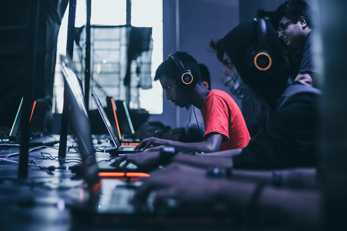 Squad of players with headsets at a LAN event